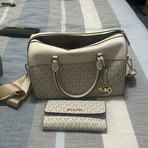 Multiple purses, Authentic Michael Kors and Coach bags some with wallet
